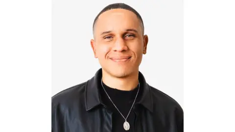 Facebook offering TikTok and YouTube creators $3,000 to post content Thomas Morgan A man wearing a black leather jacket and a silver necklace smiles at the camera
