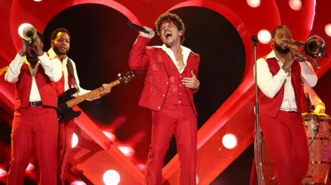 Live Nation reaches settlement in US monopoly case Getty Images for The Recording Academy Bruno Mars performs onstage during the 68th GRAMMY Awards.