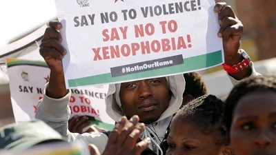 Protector or Predator? How anti-immigrant violence is undermining South Africa’s economic recovery Protector or Predator? How anti-immigrant violence is undermining South Africa’s economic recovery
