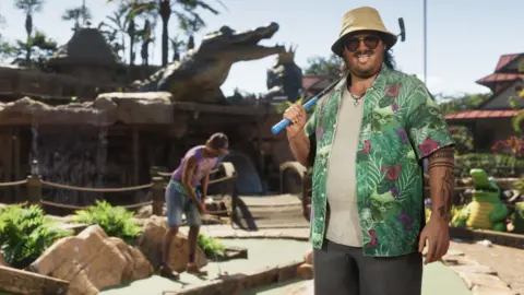 GTA 6 leaks - a nightmare or a blip for the biggest video game of the year? Rockstar Games Cal Hampton, a character from GTA 6, stands in front of an alligator-themed crazy golf course. He holds a putter over one shoulder, and pulls a tongue-out face at the viewer. His loud, green, floral shirt stands out against the browns of the golf course. Behind him, a companion can be seen lining up an attempted putt, while a large alligator statue looms over the course.