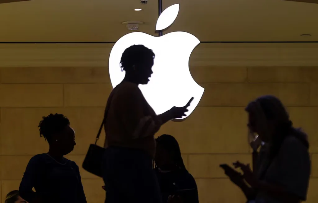 Apple briefly tops $5 trillion market value for first time