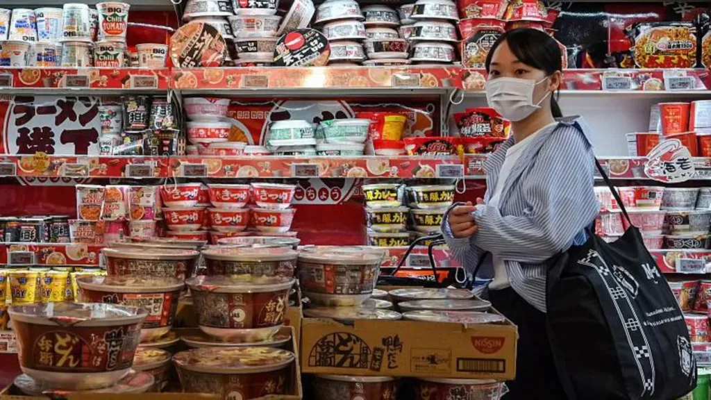 Japan raises interest rate to highest since 1995