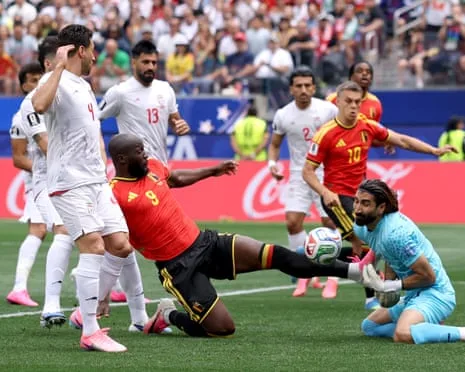 Ten-man Belgium held by Iran for second World Cup draw