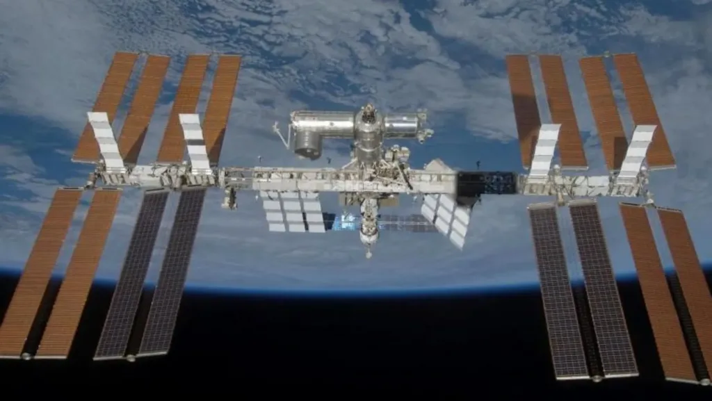 Astronauts return to ISS after sheltering during air leak repair attempt