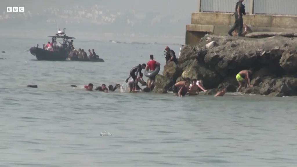 Hundreds of migrants enter Spain’s Ceuta enclave as authorities warn of humanitarian crisis