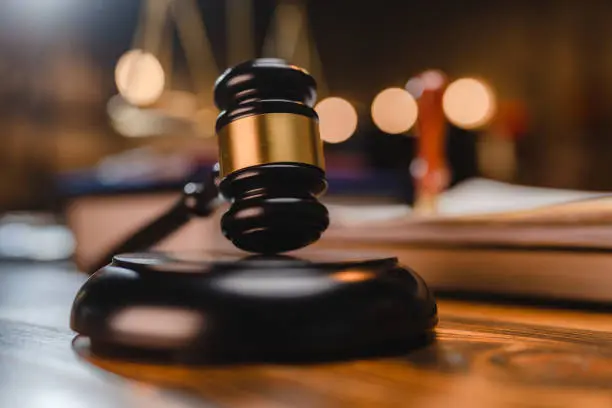 Alleged robber mistakenly shot by colleague hauled to court