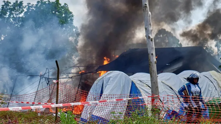 Angry crowd sets Ebola hospital tents on fire in DR Congo