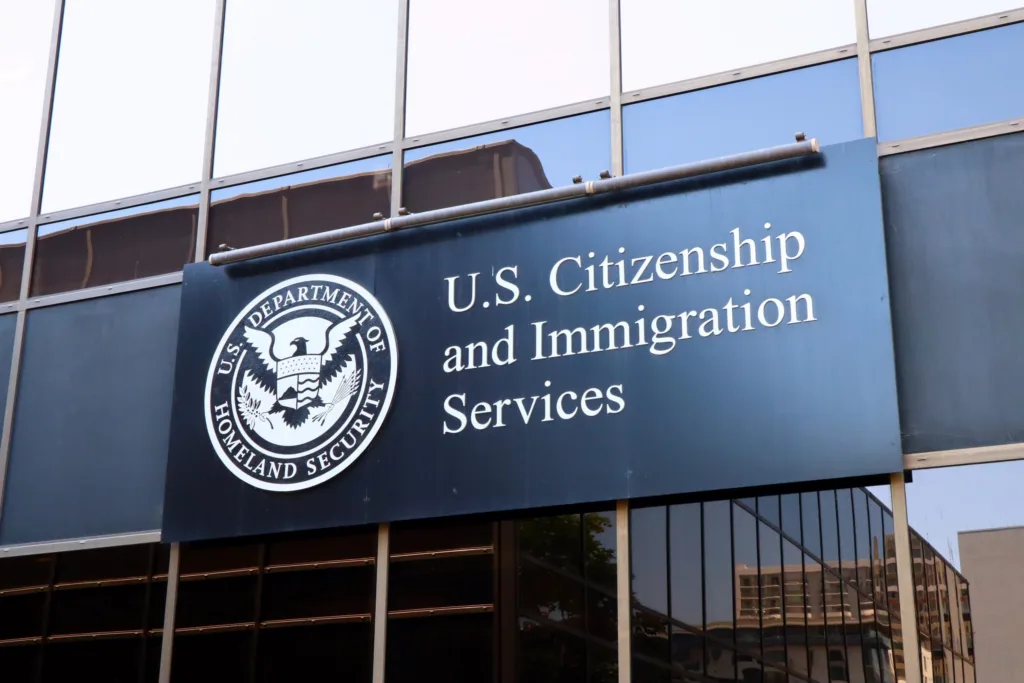 US tells foreigners seeking green cards: Return to your countries to apply