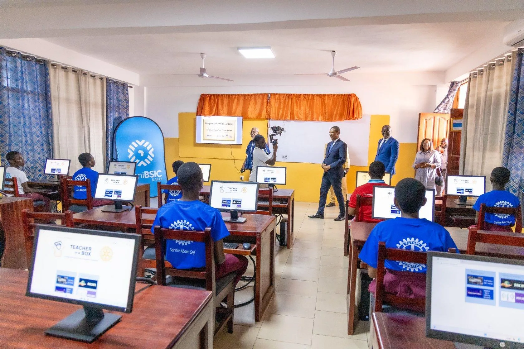 OmniBSIC Bank donates 20 computers to support robotics and digital learning at Prince of Peace International School
