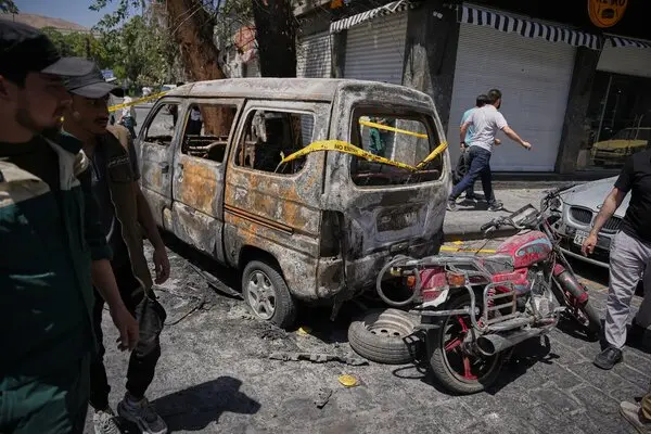 At least 18 injured in Damascus as explosions disrupt Macron visit