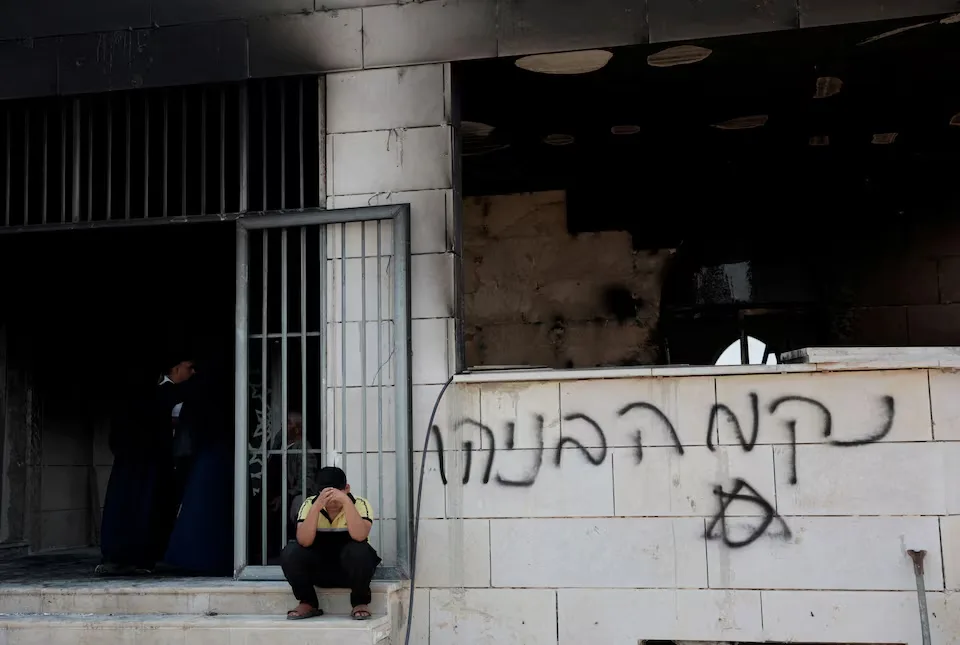 Israeli settlers set fire to West Bank mosques after deadly clash