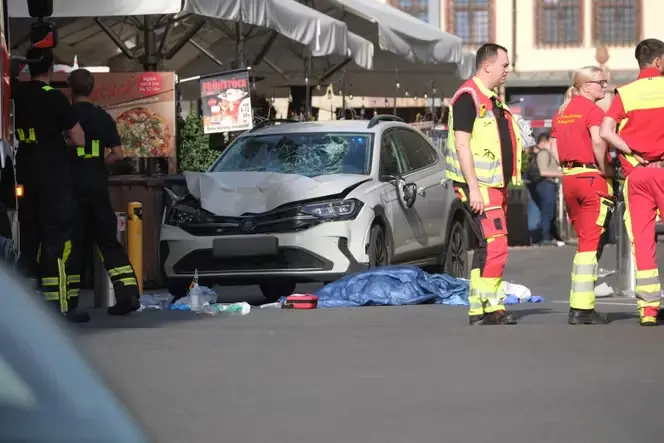 Two killed and many injured after car driven into crowd in German city of Leipzig