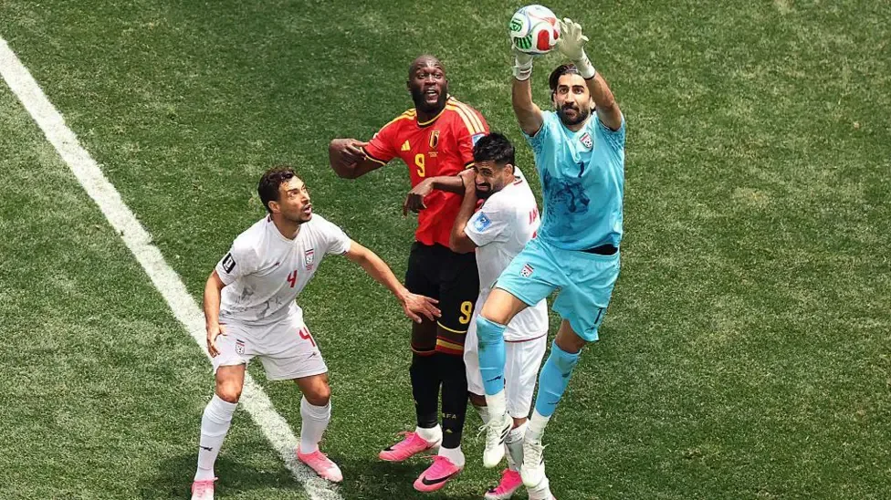 Ten-man Belgium held by Iran in second World Cup draw