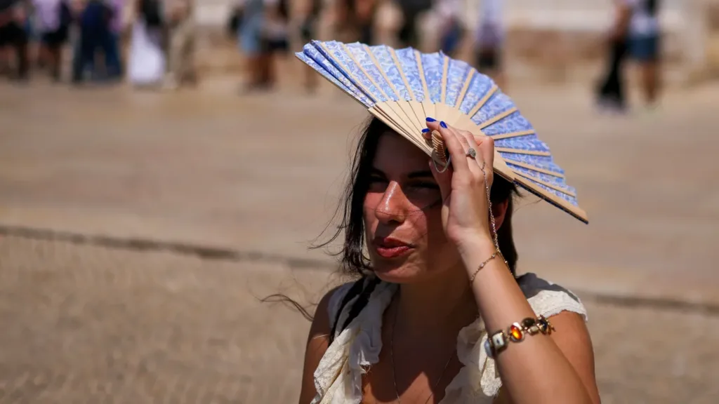 Extreme heat costing cities up to 8% of GDP and hitting women hardest, report says