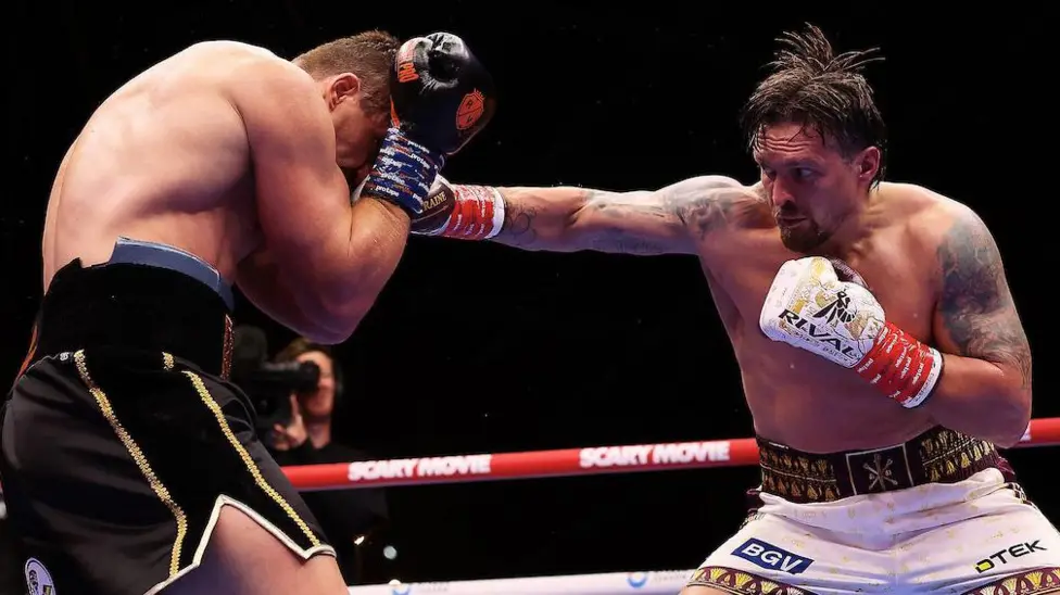 Usyk keeps titles with controversial Verhoeven stoppage