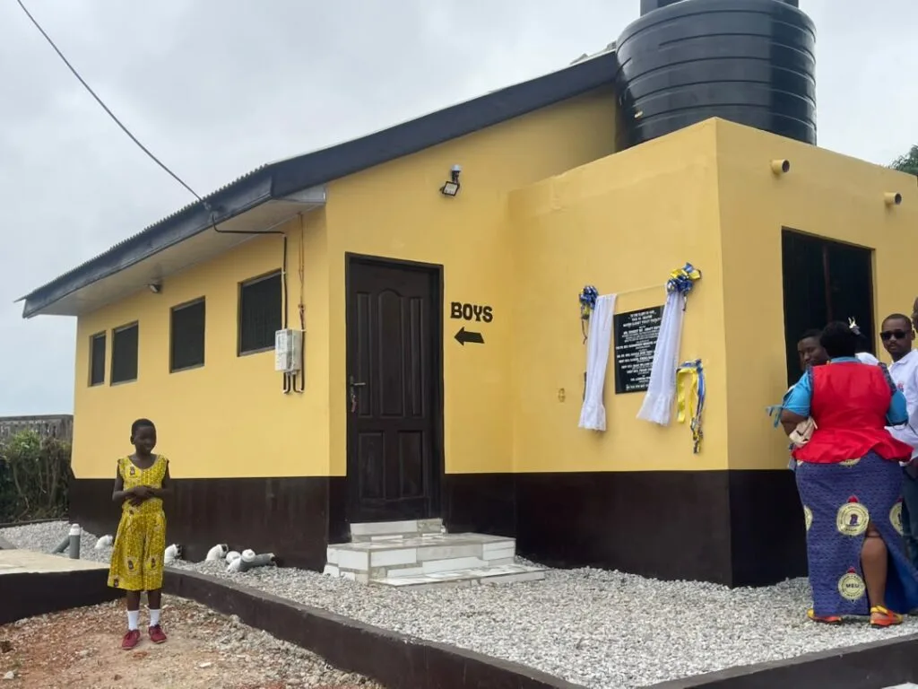 Saltpond Methodist A Basic School receives 10-seater toilet facility from alumnus