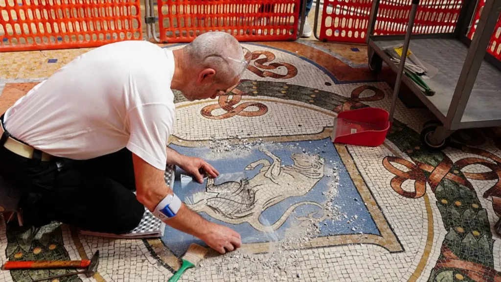 Italy restores lucky testicles on bull mosaic worn down by tourists