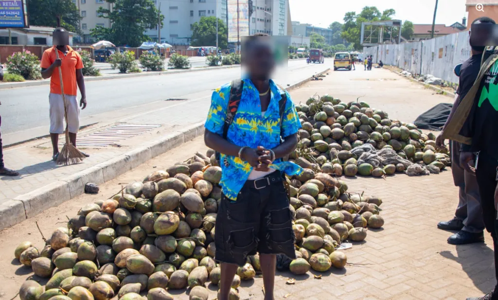 AMA arrests coconut seller for using walkway as trading, storage space