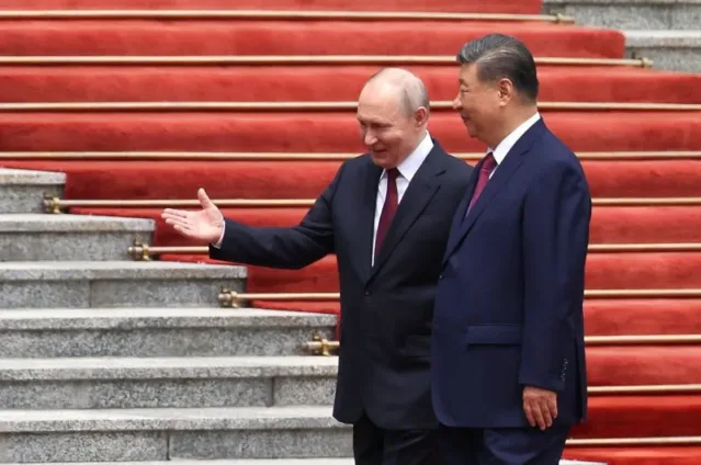 Putin says Russia-China ties at unprecedented level, invites Xi to Russia