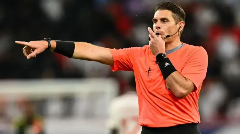 VAR official who made hand gesture returns to duty