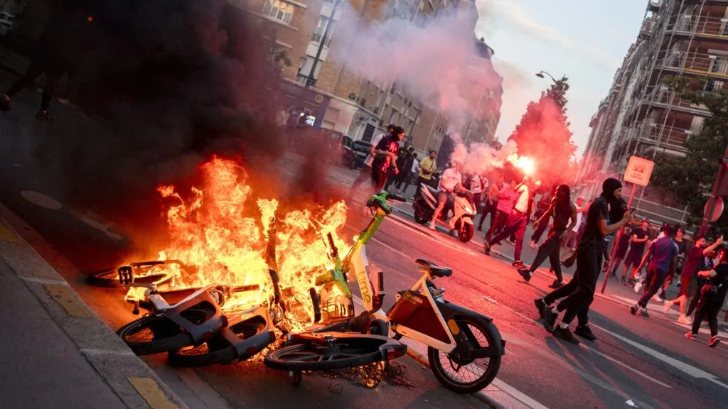 Hundreds arrested and dozens of police injured after Champions League riots in France