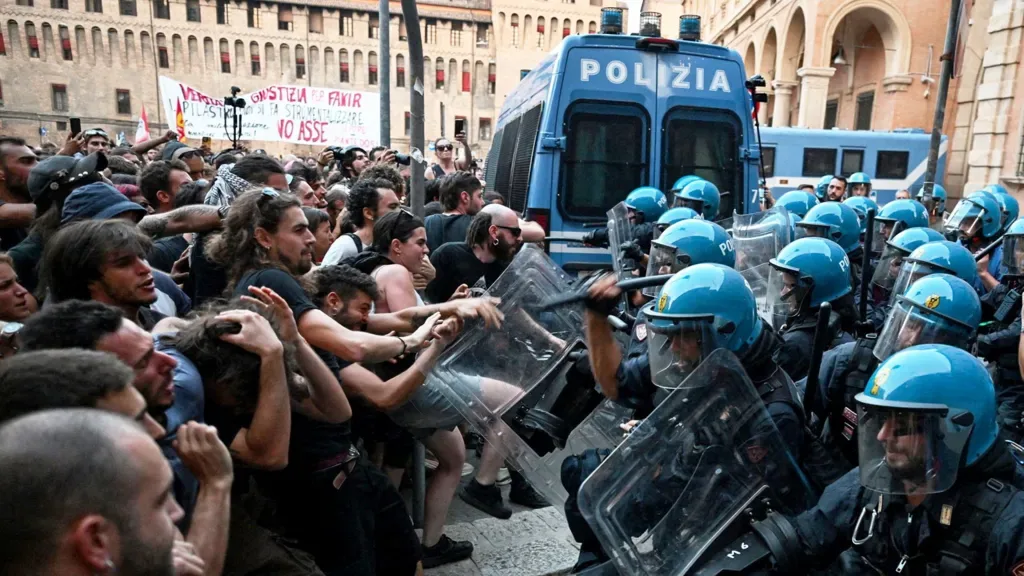Dozens hurt in Bologna protests after man dies while being restrained by police