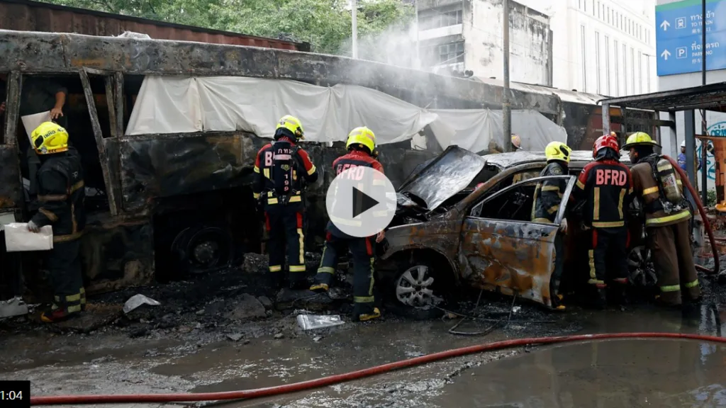 Freight train and bus crash kills at least eight in Bangkok